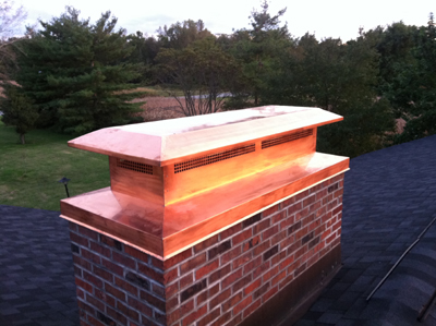 Before and after chimney cap replacement in Brentwood, NY