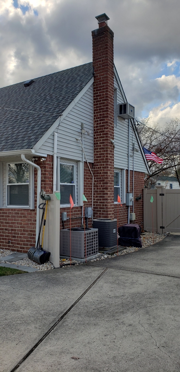 Professional chimney repointing restoring brick joints in Brentwood, NY
